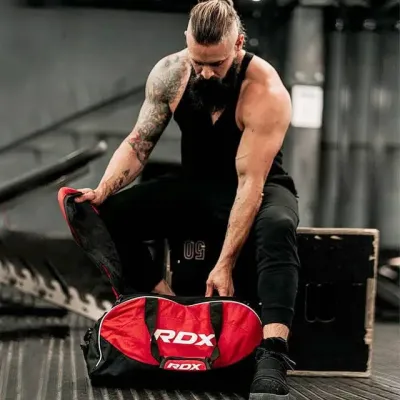 Спортивна сумка RDX R1 Duffel Bag with Backpack Straps 29х30х58 см Black/Red Спортивна сумка RDX R1 Duffel Bag with Backpack Straps 29х30х58 см Black/Red