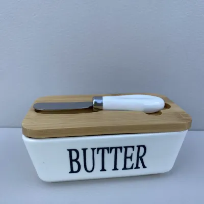Маслянка фарфорова з ножем 15х8,6х6,4 см Butter Interos PJ03629
