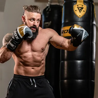 Боксерские перчатки RDX F7 Ego 12 унций Black Golden (BGR-F7BGL-12oz) Боксерские перчатки RDX F7 Ego 12 унций Black Golden (BGR-F7BGL-12oz)