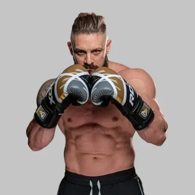 Боксерские перчатки RDX F7 Ego 12 унций Black Golden (BGR-F7BGL-12oz) Боксерские перчатки RDX F7 Ego 12 унций Black Golden (BGR-F7BGL-12oz)