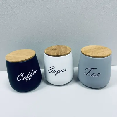 Набір керамічних банок з бамбуковими кришками BonaDi 304-034 Sugar/Tea/Coffee 3 шт 11,5х11,5х13 см 1 л Різнокольоровий (23523) Набір керамічних банок з бамбуковими кришками BonaDi 304-034 Sugar/Tea/Coffee 3 шт 11,5х11,5х13 см 1 л Різнокольоровий (23523)